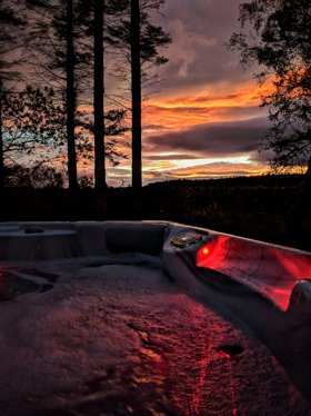 Two glasses of wine on a garden table